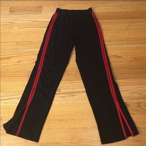 Black and red stripe track pants